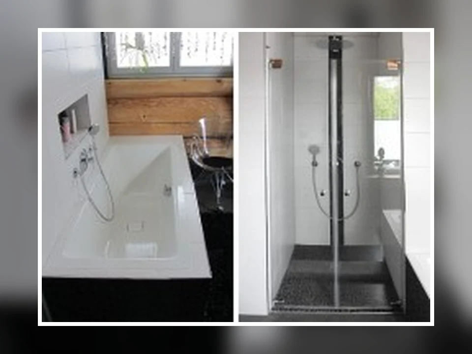 Bad in Eislingen mit Badewanne und verglastem Duschbereich